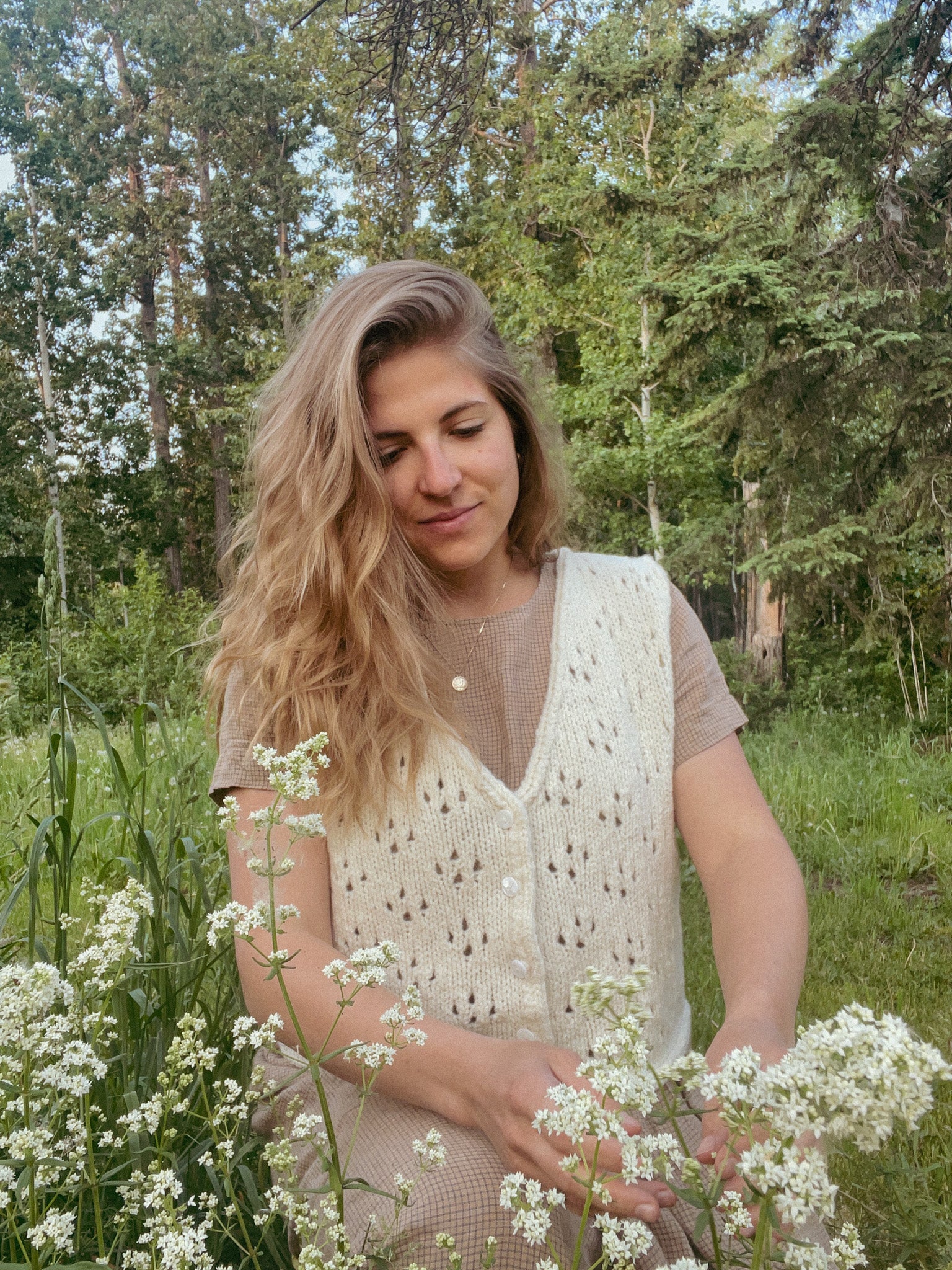 Aspen Lace Button-up - Sleeveless white wool vest with eyelet knit and buttons