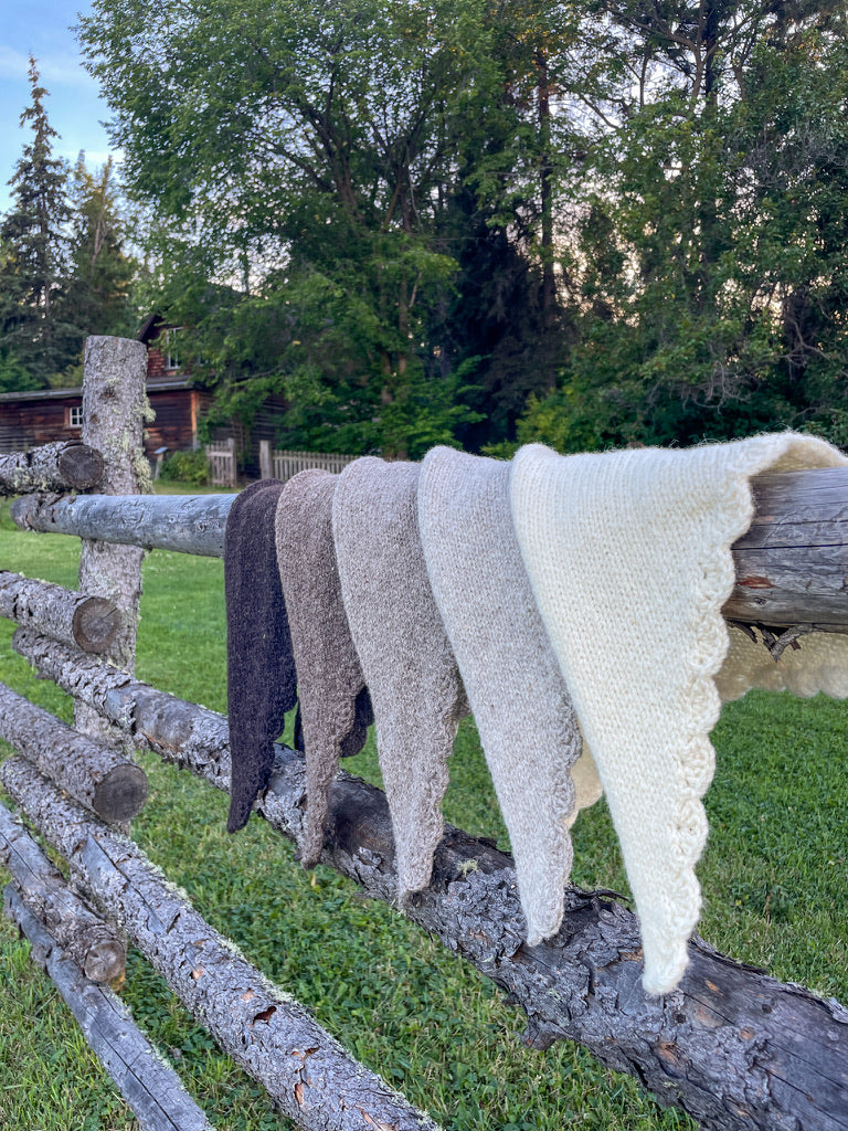 Drift Kerchief in natural wool, styled as neck scarf