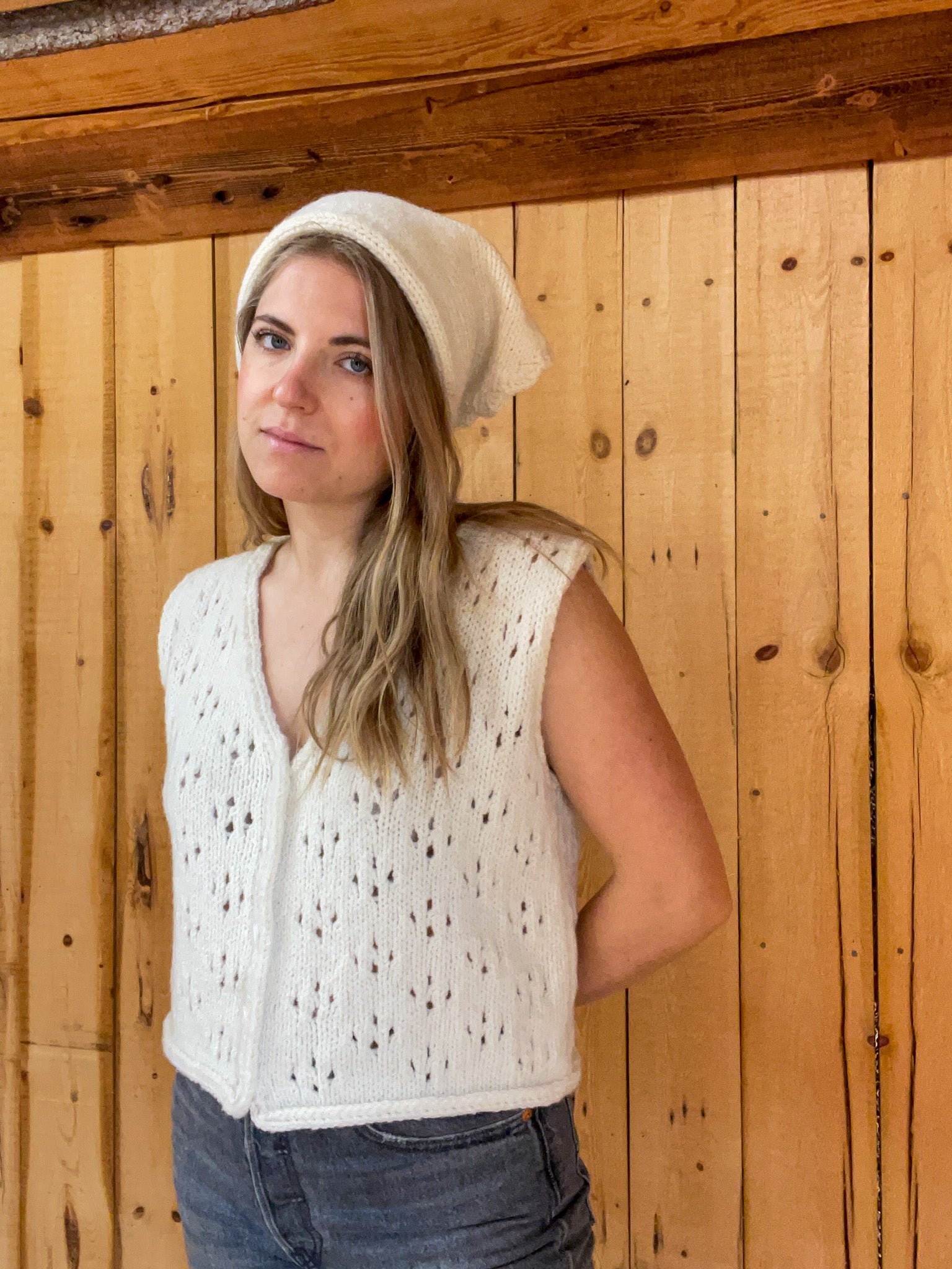 Drift Kerchief in natural wool, styled as neck scarf